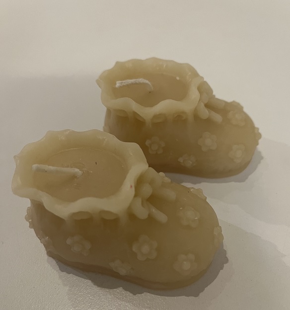 Pair of baby boots candles